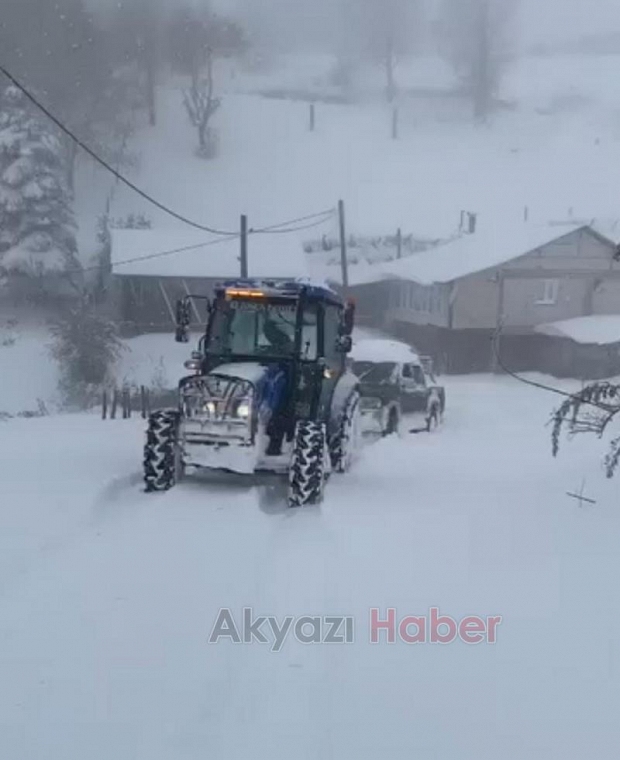 Güzlek'te muhtar yolları açtı, araçları kurtardı