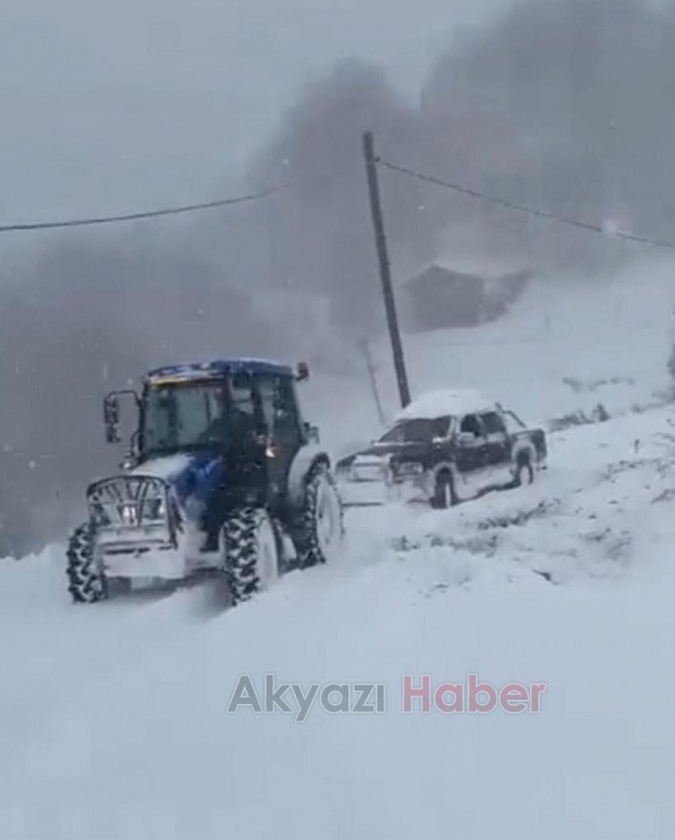 Güzlek'te muhtar yolları açtı, araçları kurtardı