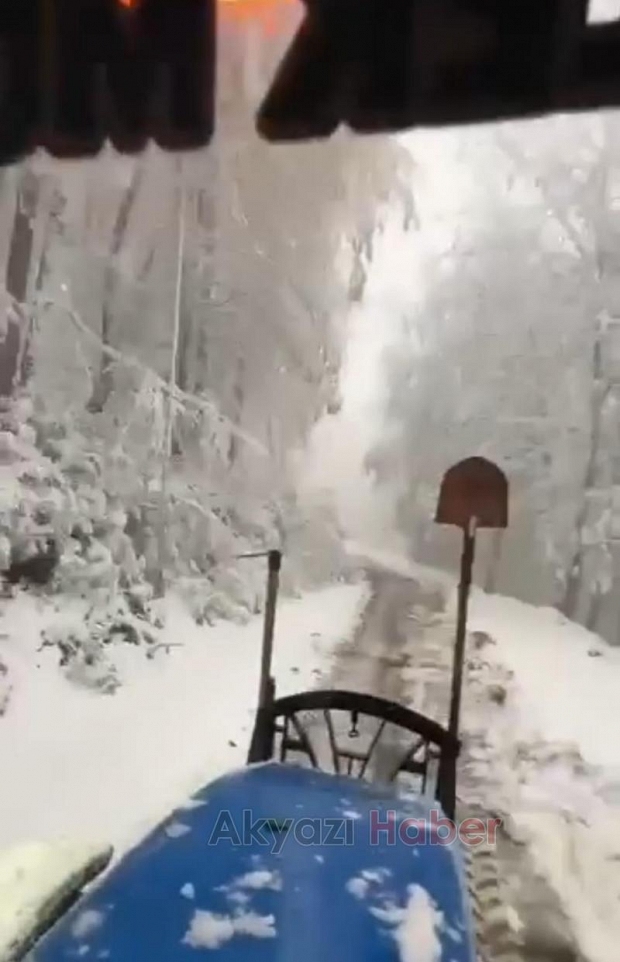 Güzlek'te muhtar yolları açtı, araçları kurtardı