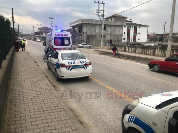 Caddede bisikletten düştü