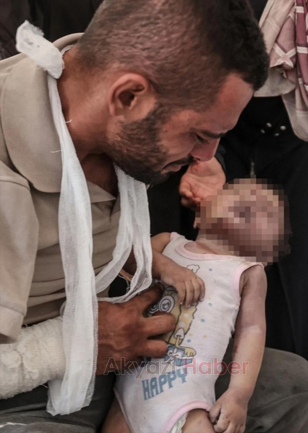 Gazze'den en acı kare: Filistinli baba evladına son kez sarıldı