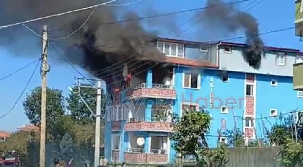 Yanan binada mahsur kalan genci itfaiyeciler kurtardı