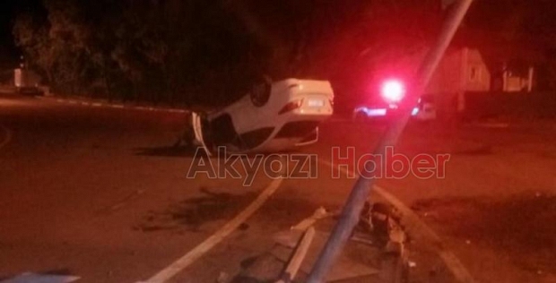 Caddede takla atıp ters döndü