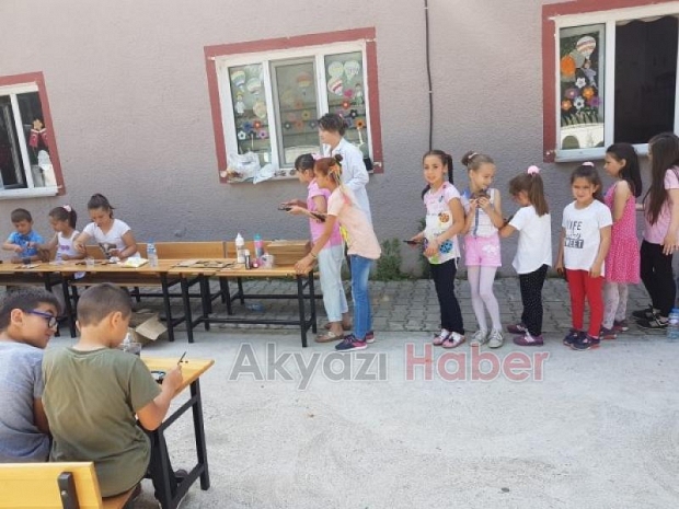 BAŞKAN AKCAN’DAN ÇOCUKLARA KARNE HEDiYESi