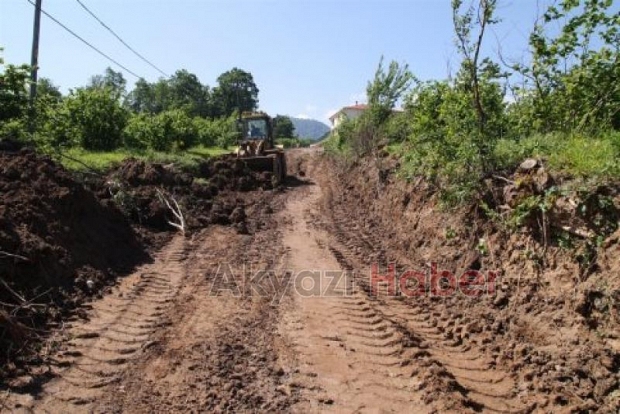 Kuzuluk Mahallesinde Yol Açma ve Malzeme Serimi