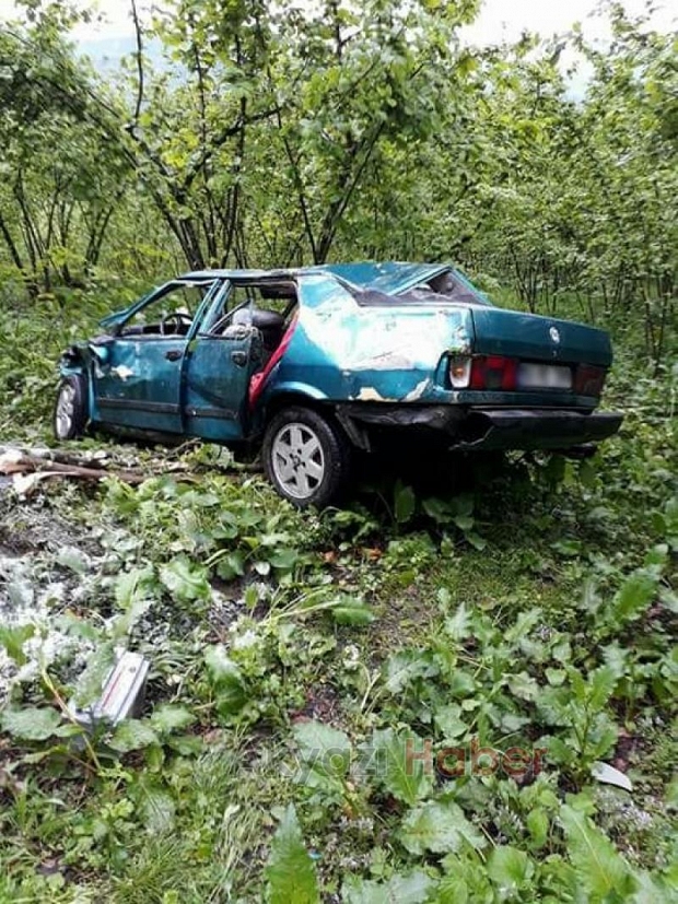 Yağmurda çöken yolda kayarak uçuruma yuvarlandı